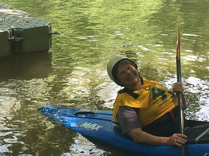 Barbara Brown, chair of the chair of the Canoe Cruisers Association, at the end of the race.