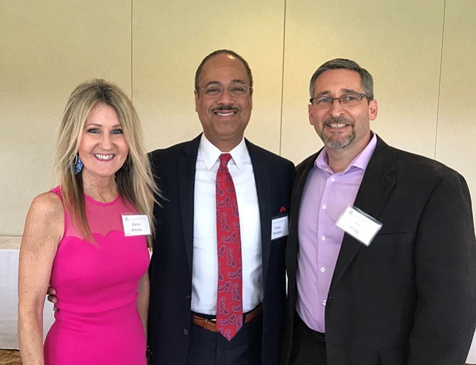 Karen Amster, fundraiser chair, Tony Perkins, keynote speaker, and Ed Hogg, from Dunn Loring-Merrifield Rotary. 