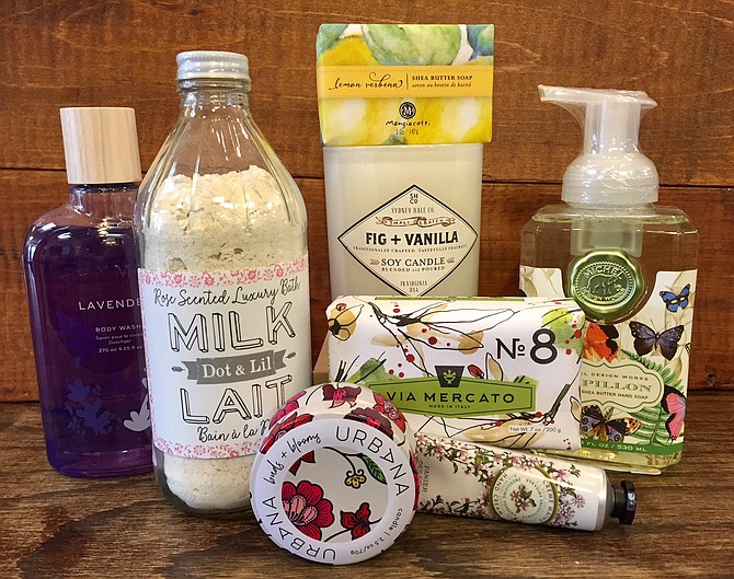 Candles, soaps and lotions in a gift bag will make luxurious end-of-year teacher gifts, says Courtney Thomas of The Picket Fence in Burke.