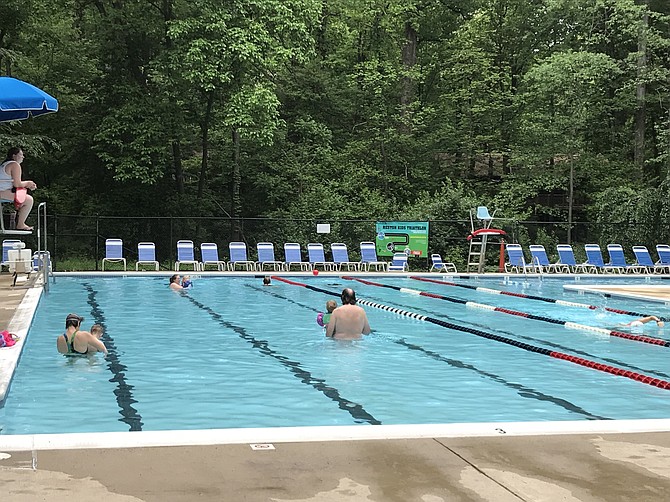 Ridge Heights Heated Pool in Reston opened Saturday, May 12, 2018. Many families enjoyed early evening swims on Monday, May, 14.