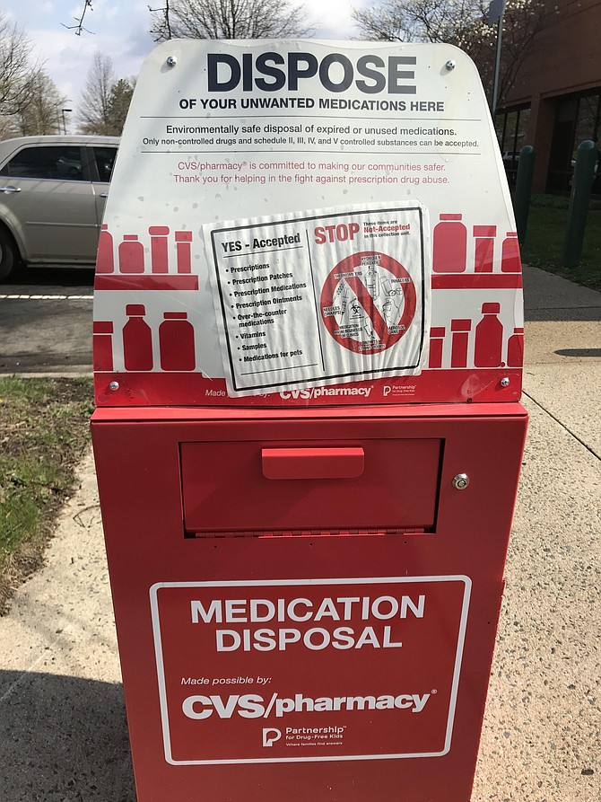 In the parking lot of the Herndon Police department sits a drug collection bin by CVS Health. It serves as an environmentally and socially responsible drug disposal site, easily accessible to the public.