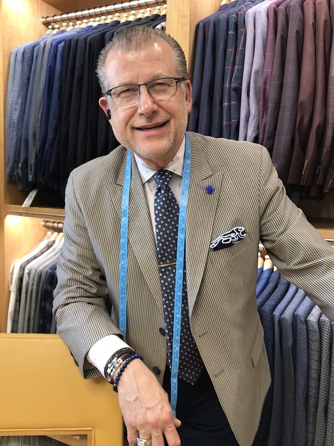 David A. Eisele Sr., owner of Davelle Clothiers at 11904 Market Street, Reston. In operation 26 years, the business offers high-quality, cutting-edge designs with impeccable fit and focus on the customer paramount. "There is no other like it anywhere," says the owner, David A. Eisele Sr.