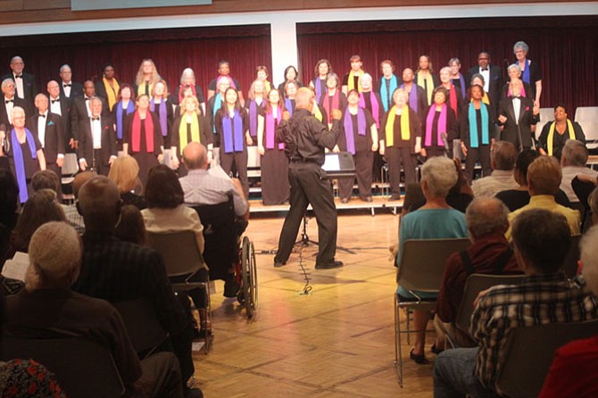 The Mosaic Harmony Community Choir performs their uplifting and inspirational “music to unite us” at a recent concert.