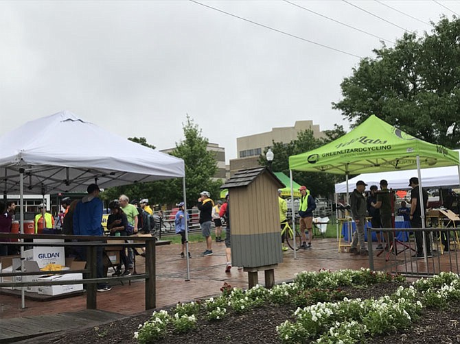 Drizzle did not stop cyclists during Bike to Work Day 2018 as they descended upon the Herndon pit stop for refreshments, bike repairs and camaraderie.