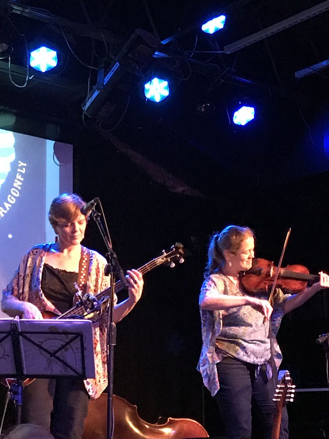 Karen Huber (bass guitar) is joined by Marcy Cochran (fiddle) during the CD Release party for "Bluebird Dragonfly" by "Song Garden" held at Jammin' Java in Vienna.  Both are members of the Herndon/Reston Folk Club.