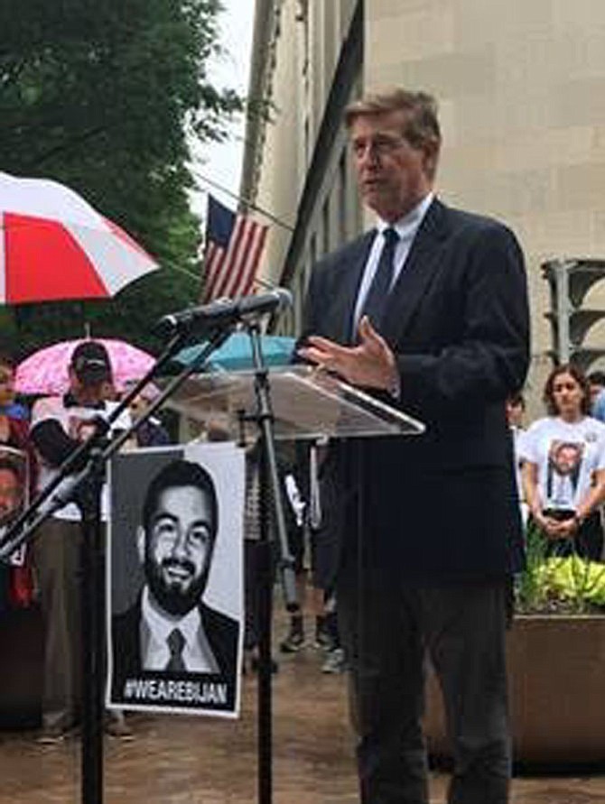 U.S. Rep. Don Beyer (D-8) addresses the crowd in front of the U.S. Department of Justice on Saturday, May 19, demanding transparency and accountability in the federal investigation into the November killing of Bijan Ghaisar at the hands of two U.S. Park Police officers.