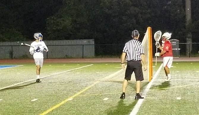 West Potomac's AJ Stamos, left, scored four goals against Annandale on Tuesday.