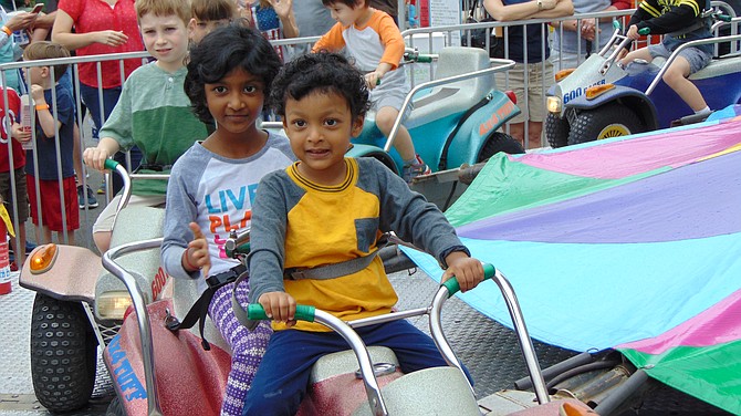 Spriha and Ishan Mohanty of Fairfax enjoy the Quad Runner Cars.