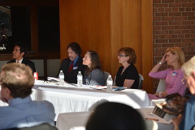 Quizzing the candidates at the Economic Equality Caucus at Lutheran Church of the Redeemer in McLean. From left: Walter Tejada, president Virginia Latino Leaders Council; caucus co-chair Lee Powell; Deanna Heier, Social Concerns Committee chair at Lutheran Church of the Redeemer; Eileen Ellsworth, CEO, Community Foundation of Northern Virginia; and Megan Malone, Board of Trustees member, Phillips Programs for Children and Families.
