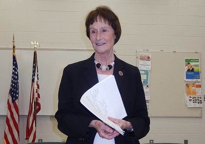 Board of Supervisors Chairman Sharon Bulova listens to a question from the audience.