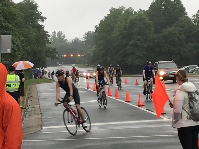Rain fell and made the roads slick, slowing down participants’ times in the Reston Sprint Triathlon 2018.