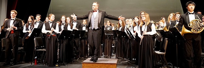 Band Director Chris Weise and Symphonic Band Students.