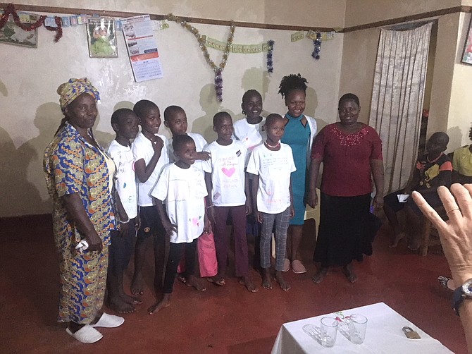 Kibwezi children in Kenya wearing the Clifton-made t-shirts.