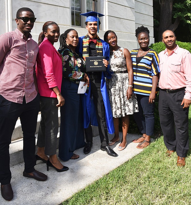 Umar Sanusi, Adama Kanu, Henncia Williams, Mar Jamal Jaffa, Banaru Smith, Abdul Sasso, and Phebean Williams at Churchill High School’s graduation on Wednesday, June 6.