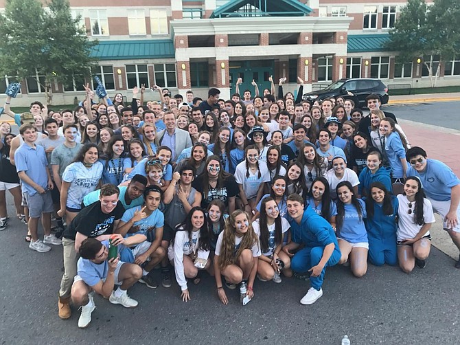 Rising seniors at Walt Whitman High School pose last June at a senior night event for the students to get to know each other as a class and make plans for senior year. Now they are graduates of the Class of 2018.