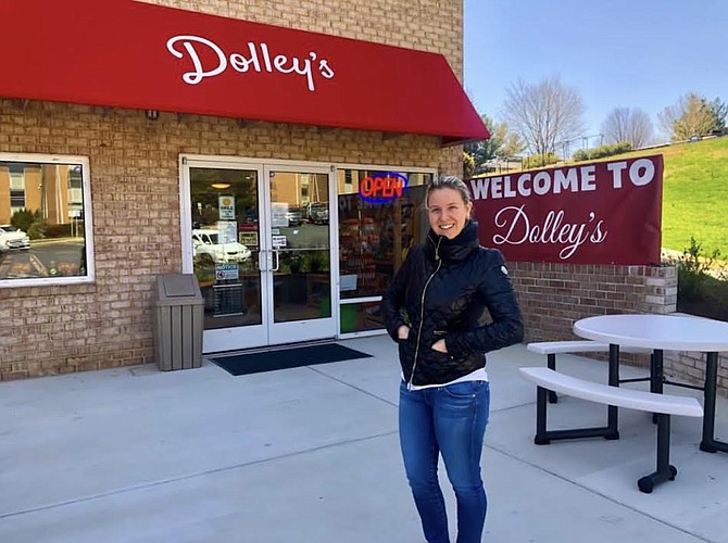 Dolley’s operator, Kate Ritzenberg, in front of the store. Her grandfather built Dolley Madison Apartments more than 50 years ago, and late last year she converted one of them into Dolley's. 
