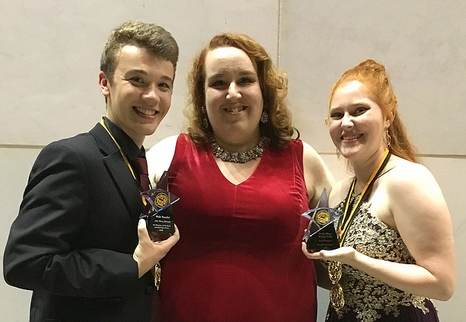 For Westfield’s production of “The Phantom of the Opera,” John Henry Stamper – acting in the title role – captured the Male Vocalist award, and Sarah Bourgeois was honored as Rising Critic. They are congratulated by Westfield Theater Director Rachel Harrington Johnson. At the Gala, Stamper and Molly Van Trees performed the show’s title song onstage and received the evening’s only standing ovation.