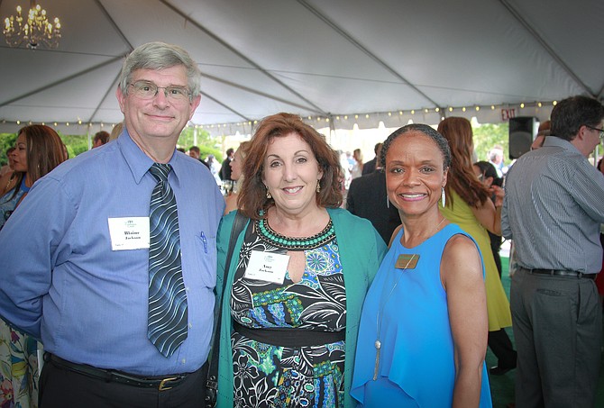 Campagna Center president and CEO Tammy Mann, right, is joined by Blaine and Amy Jackson at the Bright Futures benefit June 1 at United Way Worldwide headquarters. The event raised close to $300,000 for Campagna Center programs.