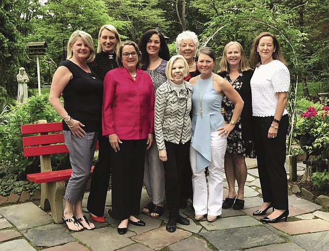 Julie Casso (fourth from left) with the Great Falls Friends and Neighbors Board members.