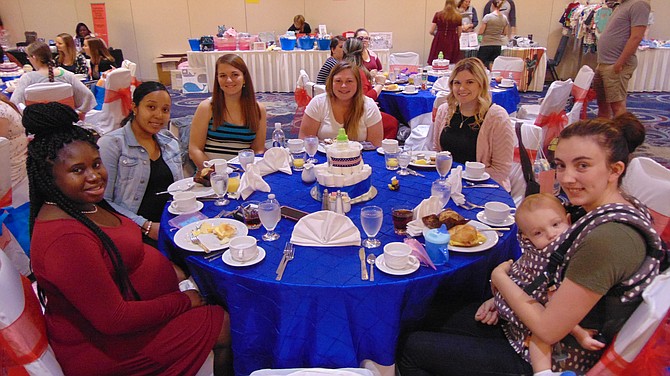 Some of the 50 women participating in the Baby Shower sponsored by Operation Homefront at the Springfield Hilton.