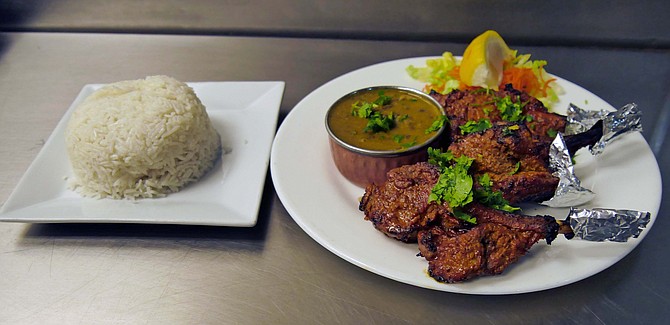 Tandoori lamb chops with creamy lentils and basmati rice.