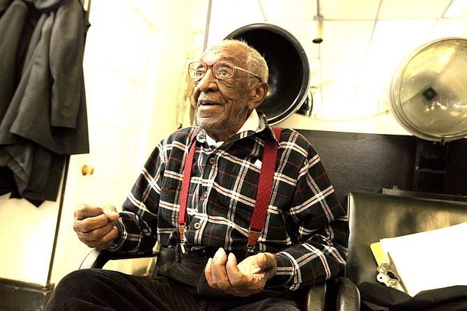 William Charity, who drove a taxi in Alexandria for 52 years, was the eldest parishioner at Ebenezer Baptist Church and died on June 15. Here he sings with the Barbershop Bible Study Ministry at the All American Barbershop in Old Town at 1106 Queen St. 