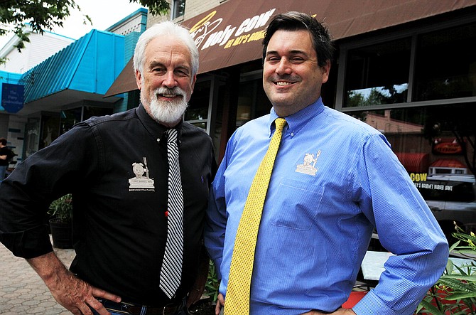 Mike Anderson (on left) and Bill Blackburn, partners with the Alexandria-based Homegrown Restaurant Group, outside their restaurant Holy Cow on Mount Vernon Avenue in Del Ray.