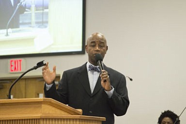 Chaplain Barry Black giving words of encouragement to the audience.