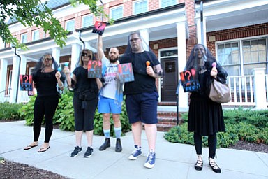 Protestors with the DC chapter of Gays Against Guns protest outside of the home of U.S. Department of Homeland Security Secretary Kirstjen Nielsen, June 26.