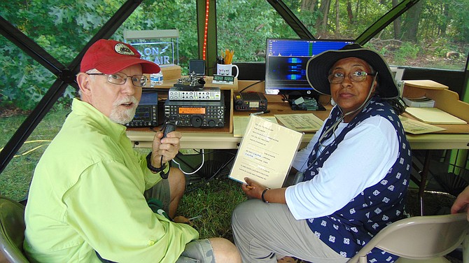 Gary Mannering of Falls Church (KJ4PZP) and Rebecca Cody of Herndon (KM4RDS) at the Get on the Air Tent.
