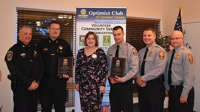 The Respect for Law Award winners pictured with their plaques after the ceremony. (From left: Deputy Chief Dan Janickey, MPO Tim Seitz, Optimist Club Vice President of Community Anna Ryjik, PFC Jason Mizer, Second Lieutenant Brian Gaydos, Lieutenant David J. White)
