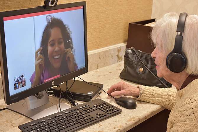 Communicating with Brazil at the senior center in Burke