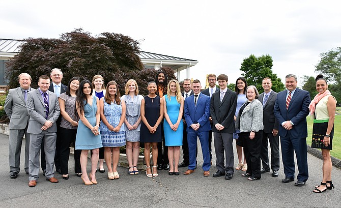 Scholarship winners with members of the NWFCU Foundation Board of Directors and Alexzandra Shade.