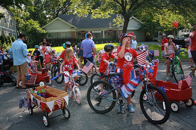 Kids on bikes led this parade in the Marlan Forest parade.