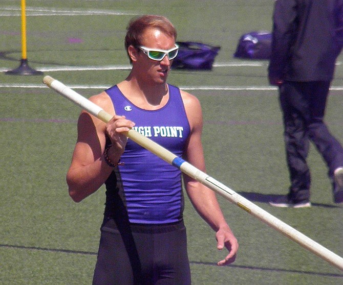 Pole vaulter Austin Miller prepares to run, plant the flexible pole and when it bends nearly 90 degrees, it will recoil, unleashing the power to propel him up and over the bar, soaring a hopeful 18 feet plus at the High Point University, Big South Conference Finals.