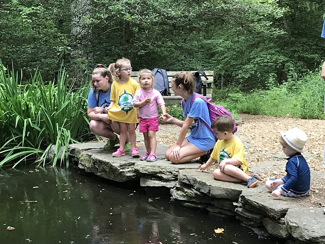 Children at the Walker Nature Center learn about the world around them through hands-on activities.