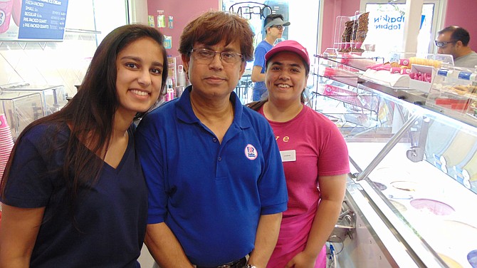 (From left): Syeda Akther; Syed Ahmed, owner of Baskin Robbins; and Lindsey Sikand at the grand opening of the Baskin Robbins.