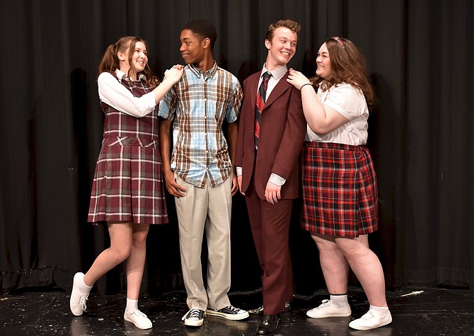 Rehearsing a scene from “Hairspray” are (from left) Kaya Trippel, Jalin Dew, John Henry Stamper and Meredith Kilmartin.