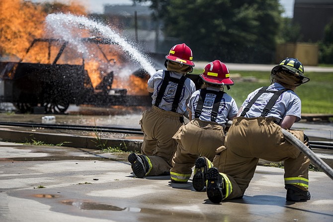 Participants in the the Fairfax County Fire and Rescue Department’s Girls Fire and Rescue Academy used their newly acquired skills to respond to simulated emergencies.