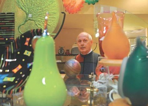 Joseph Egerton in his Arts Afire Glass Gallery in 2011. Egerton died May 16 at the age of 79.