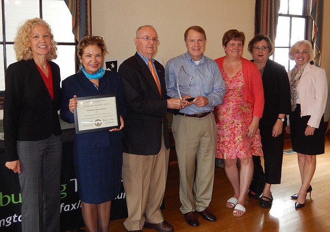 Rebuilding Together is honored: From left are Patti Klein, Diana Paguaga, Richard Lindsay, Mayor David Meyer, Amy Marschean, Linda Bufano and Caroline Blakely.