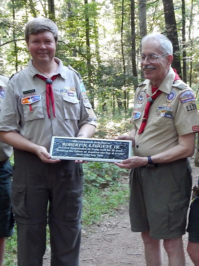 New Scoutmaster Steve Englund presents the Camp Leggett dedication plaque to retired Scoutmaster Bob Leggett.