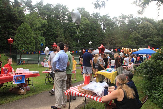 An estimated 500 people attend Middleridge’s National Night Out to bond as a community and relax for a summer’s evening.