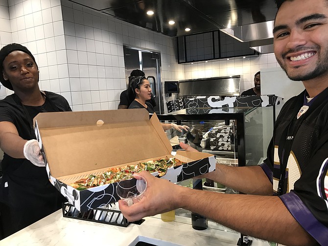 "This is the best pizza ever," said Ricardo Lopez, who works in Reston. "The garlic ricotta sauce is really good; one of my favs. I've convinced my co-workers to come.  This is my third pizza; I’m going to have to hit the gym."