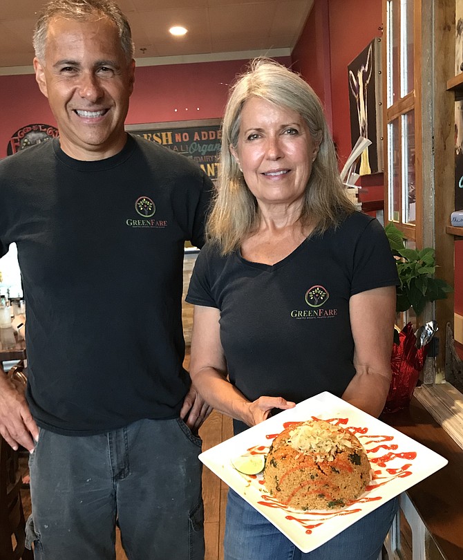 Pericles Silva, GreenFare operations manager, joins Gwyn L. Whittaker, CEO of GreenFare Organic Cafe in Herndon. The cafe is the first Platinum REAL Certified Restaurant in Virginia. It offers organic, whole plant food dishes, 7-day meal plans, books, classes and lectures.  