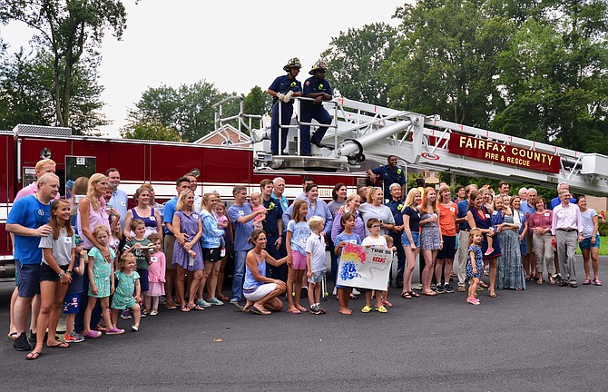 Residents of the Timberly neighborhood in McLean gathered to express their thanks to law enforcement and public safety personnel during the neighborhood’s National Night Out celebration.