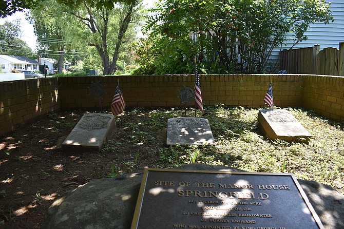 The grave of Col. Charles Broadwater (middle) at the site of the Springfield manor house, where he lived.
