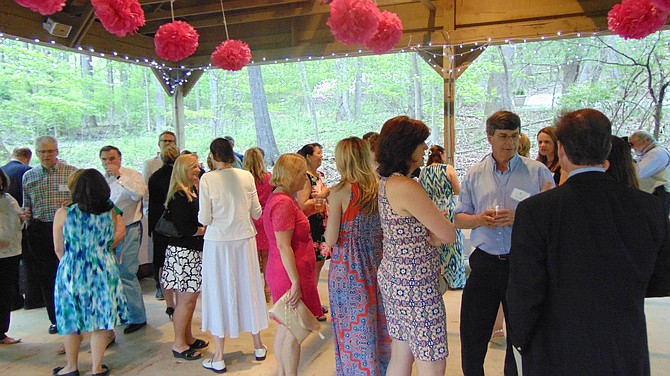 Guests mingle at the New Dominion Women’s Club party.