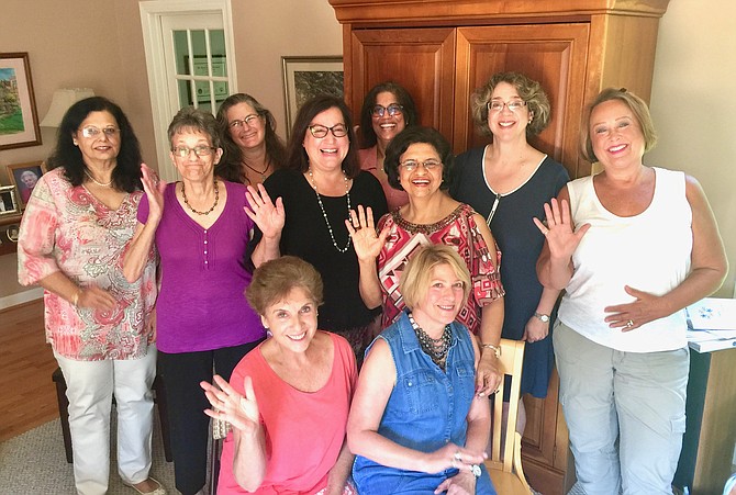 Potomac Area Neighbors Club board (from left): Poonam Mannan, Marjorie Rothschild, Kim Belvin, Laura Nash, Madhu Shekhar, Archana Dheer, Suzel Lemus, Susan Rosen; sitting: Alexa Kempel, Joanne Zinsmeister; not in picture: Anu Reddy.