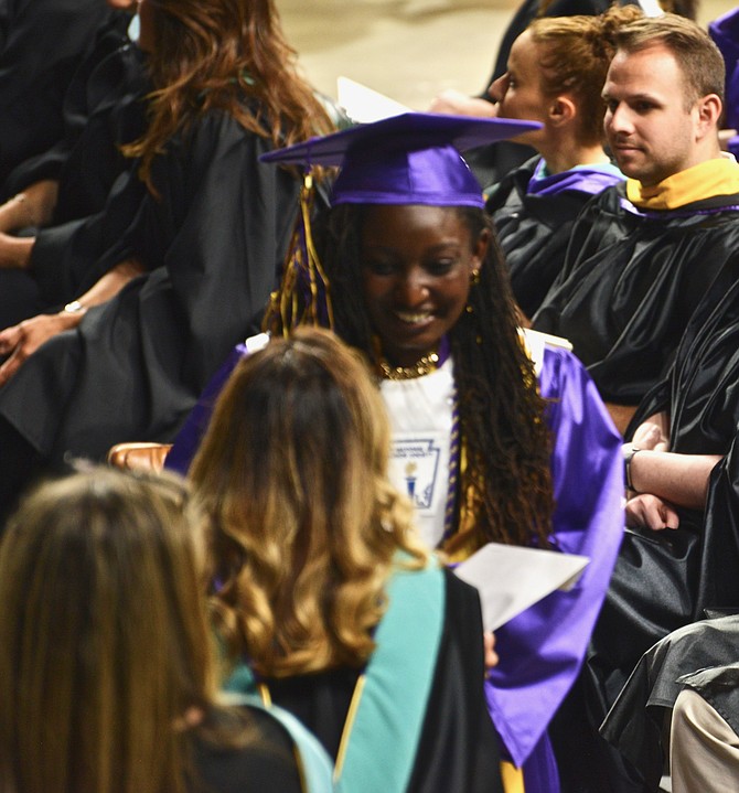 Top-rated high schools: One of the shining stars from Lake Braddock Secondary School’s 2018 graduating class, Sinclaire Jones accepts her diploma. Her proud family reports that Sinclaire is heading to Princeton, where she will study to be an astrophysicist.